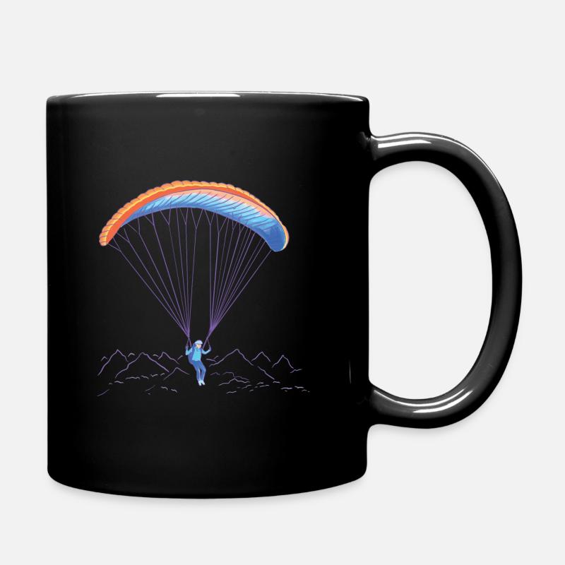 Les parapentes survolent les montagnes - Mug uni - noir