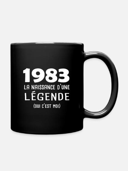1983 la naissance d'une légende cadeau année - Mug uni - noir