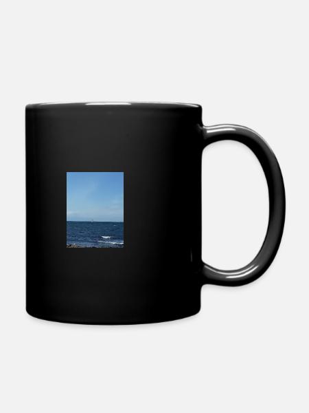 Sailboat out on the open sea in sunny Sweden - Full Colour Mug - black