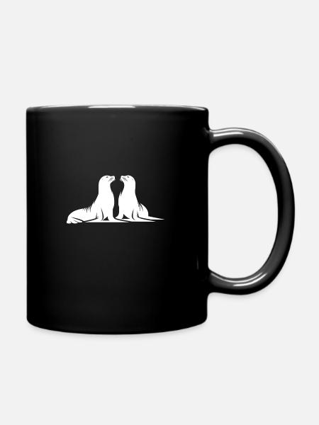 Niedliche Seehunde am Meeresstrand - Tasse einfarbig - Schwarz