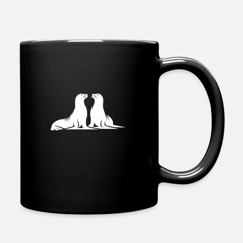 Niedliche Seehunde am Meeresstrand - Tasse einfarbig - Schwarz