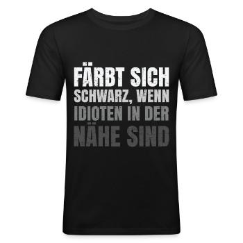 Färbt sich schwarz wenn Idioten in der Nähe sind - Männer Slim Fit T-Shirt - Schwarz - Vorne - Nik (191cm)