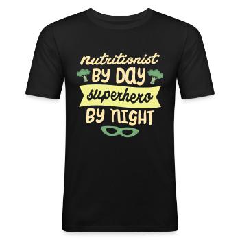 Nutritionniste le jour Super-héros la nuit - T-shirt près du corps Homme - noir - Devant - Nik (191cm)