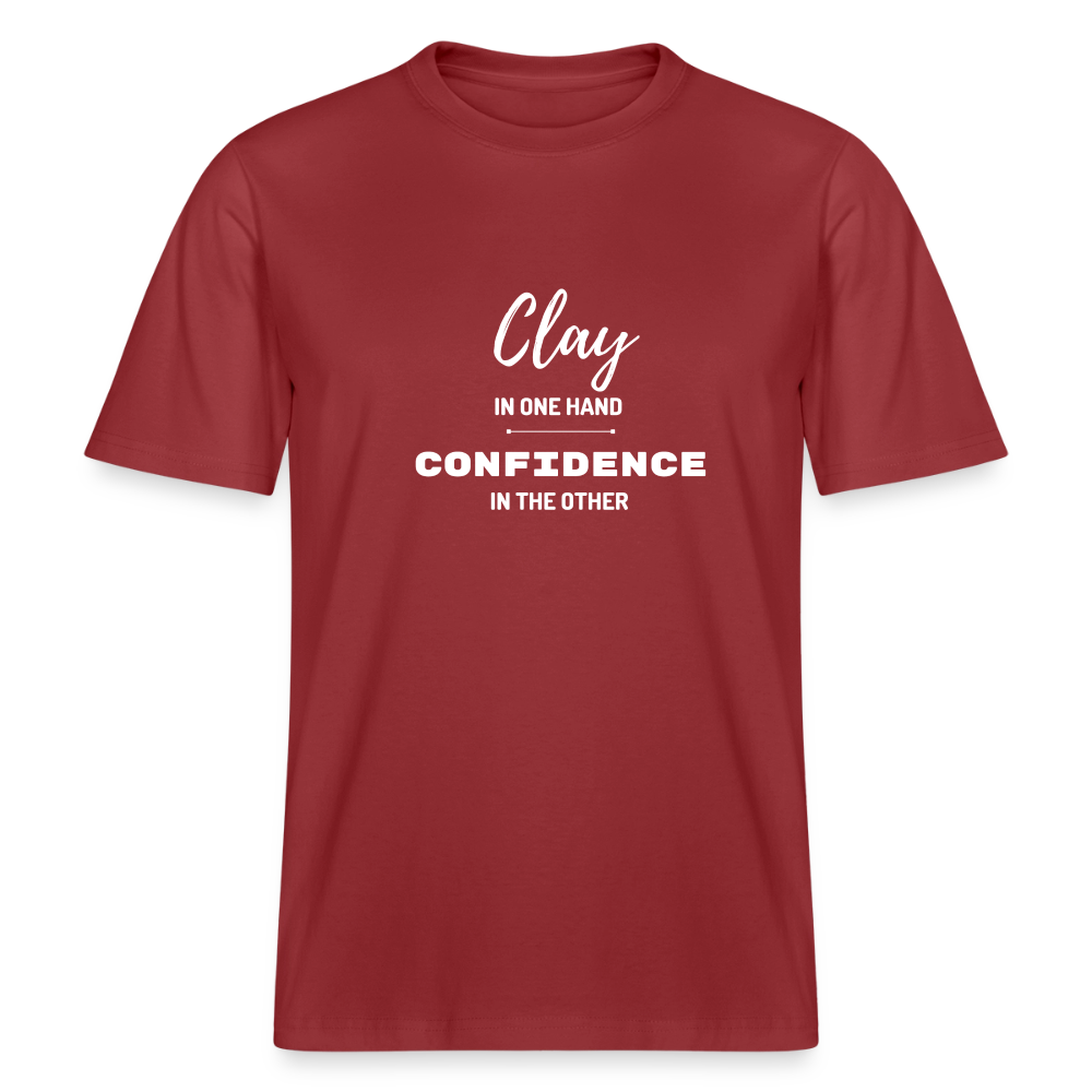 Clay In One Hand, Confidence In The Other · Organic T-shirt — red earth — front